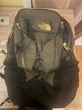 The North Face Borealis Backpack in Charcoal and Black with Gold Accents